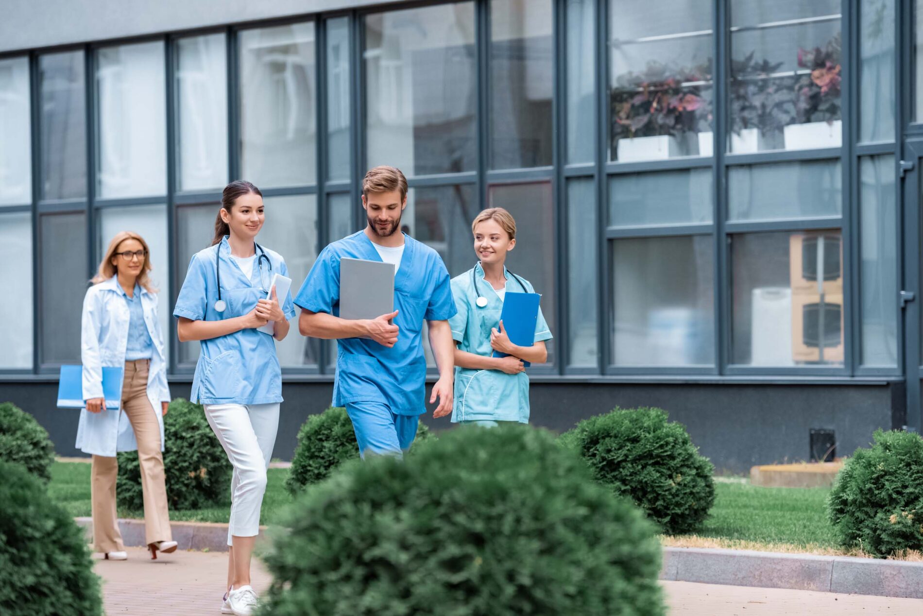 medical students walking together on street