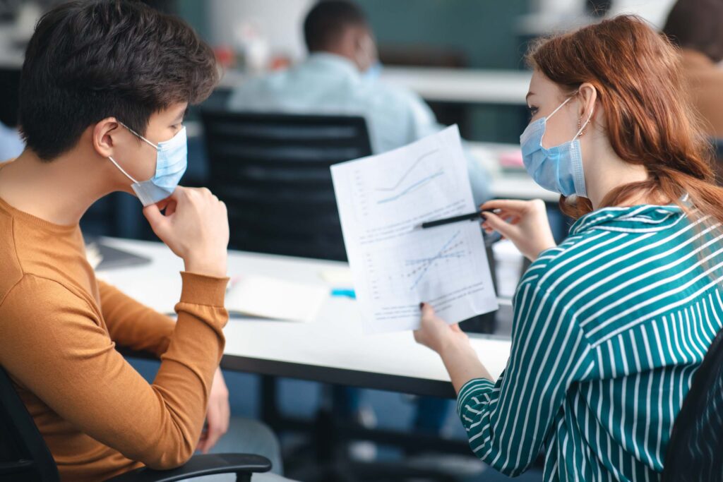 medical students reviewing paper